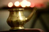 A brass vessel catching the light